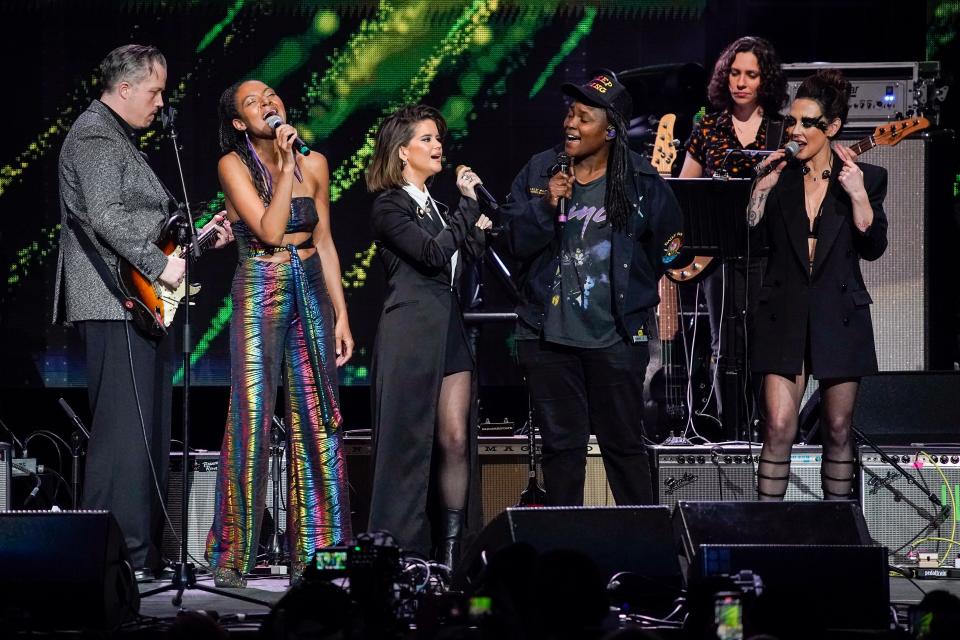 Left to right, Jason Isbell, Allison Russell, Maren Morris, Joy Oladokun and Amanda Shires perform during the Love Rising concert at Bridgestone Arena in Nashville, Tenn., Monday, March 20, 2023.