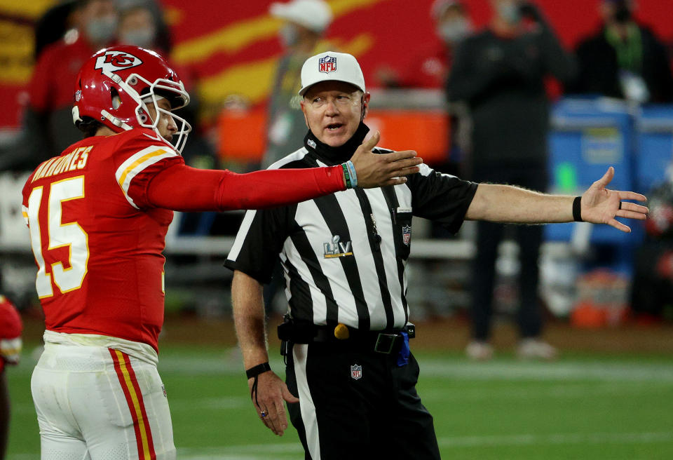 TAMPA, FLORIDA - FEBRUARY 07: Patrick Mahomes #15 of the Kansas City Chiefs speaks with referee Carl Cheffers #51 during the fourth quarter of the game against the Tampa Bay Buccaneers in Super Bowl LV at Raymond James Stadium on February 07, 2021 in Tampa, Florida. (Photo by Patrick Smith/Getty Images)