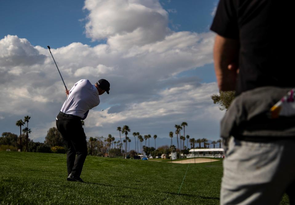 Kevin Sutherland hits from the rough along the ropes on the 18th fairway during the second round of the Galleri Classic in Rancho Mirage, Calif., Saturday, March 25, 2023. 