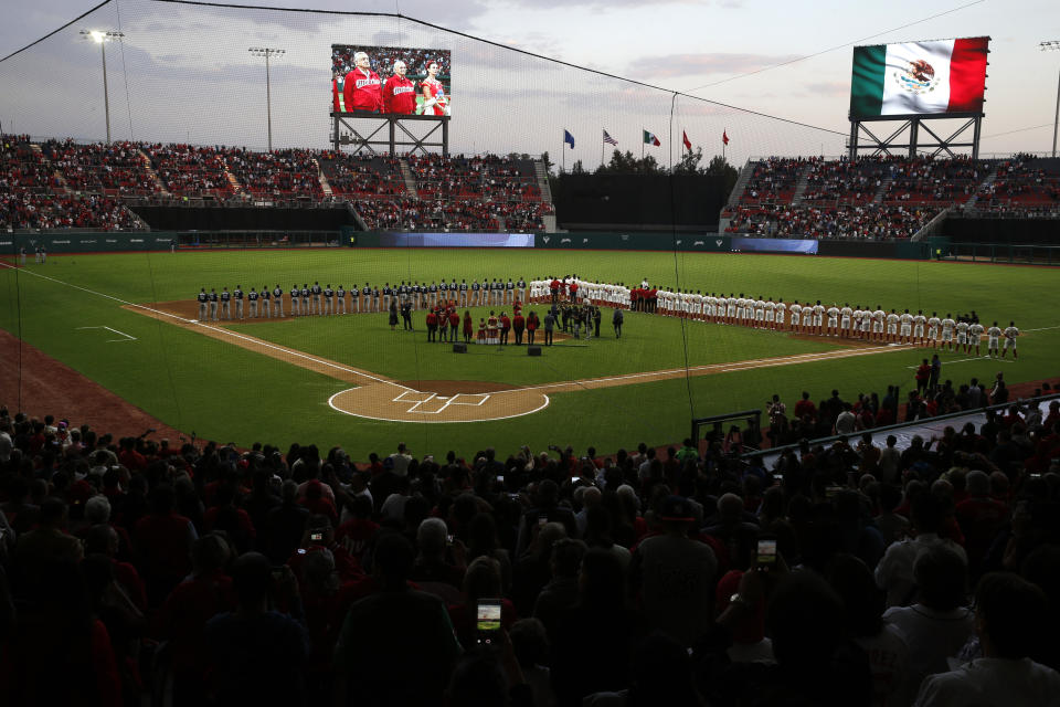 A view of the inauguration ceremony at the Alfredo Harp Helu Stadium, the new home of Los Diablos Rojos baseball team, in Mexico City, Saturday, March 23, 2019. (AP Photo/Marco Ugarte)