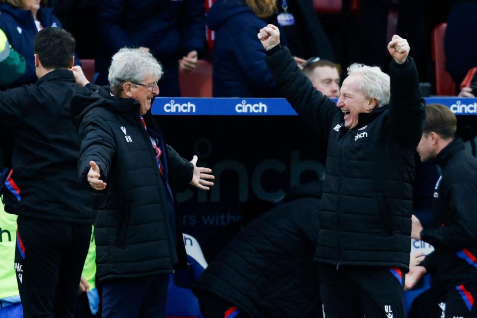 The returning Roy Hodgson and Ray Lewington celebrate on a memorable day at Selhurst Park (AFP via Getty Images)