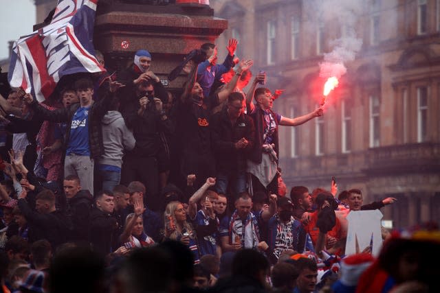 Rangers fans celebrate winning the Scottish Premiership in George Square