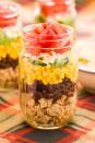 <p>Layers of turkey mince, black beans, corn, spring onions, cheese, and tomatoes is lunchtime goals. </p><p>Get the <a href="https://www.delish.com/uk/cooking/recipes/a29891198/taco-salad-in-a-jar-recipe/" rel="nofollow noopener" target="_blank" data-ylk="slk:Taco Salad Jar;elm:context_link;itc:0;sec:content-canvas" class="link ">Taco Salad Jar</a> recipe.</p>