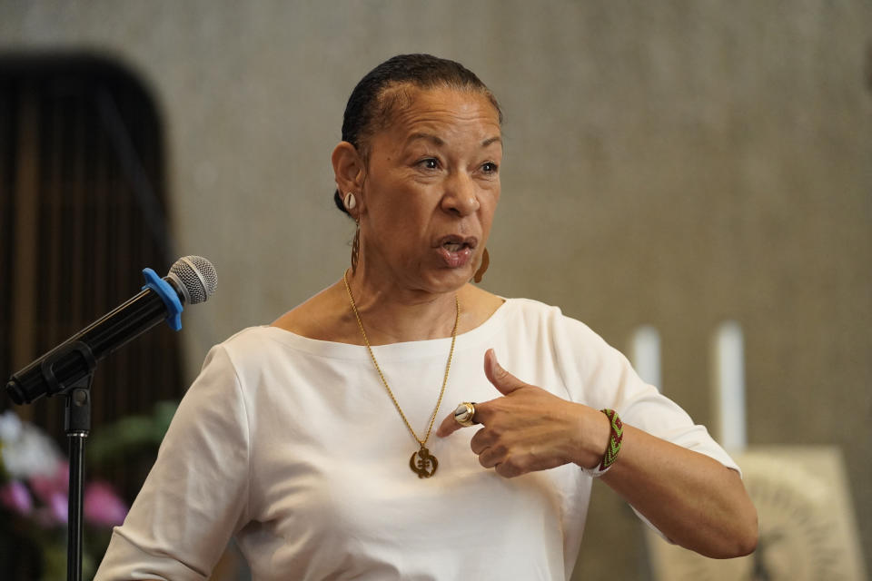 Dr. Cheryl Grills, professor at Loyola Marymount University and member of the California Reparations Task Force, addresses survivors and descendants of Palm Springs Section 14 residents gathered at the United Methodist Church in Palm Springs, Calif., Sunday, April 16, 2023. Black and Latino Californians who were displaced from their Section 14 neighborhood in Palm Springs allege the city pushed them out by hiring contractors to destroy homes in an area that was tight-knit and full of diversity. (AP Photo/Damian Dovarganes)