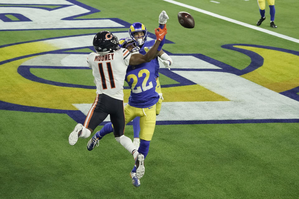 Los Angeles Rams cornerback Troy Hill (22) tips a pass in the end zone intended for Chicago Bears wide receiver Darnell Mooney (11) during the second half of an NFL football game Monday, Oct. 26, 2020, in Inglewood, Calif. The ball was caught by Rams safety Taylor Rapp, behind, for a touchback. (AP Photo/Ashley Landis )