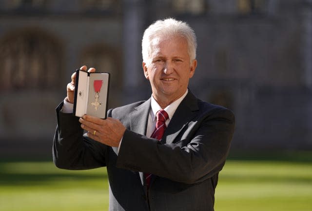 Louis Cayer after being appointed MBE (Member of the Order of the British Empire) by the Princess Royal during an investiture ceremony at Windsor Castle