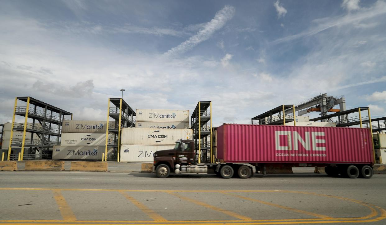 A truck hauls a container from the Georgia Ports Authority Garden City Terminal.