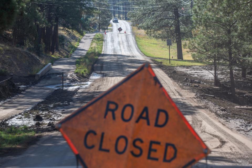 A road remains closed due to a flood on Ruidoso Creek on Cree Meadows Drive on June24, 2024