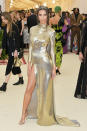 <p>Never one to put a fashion step wrong, Emily Ratajkowski ticked all the Met Gala boxes in this long-sleeved gold Marc Jacobs dress. Photo: Getty Images </p>