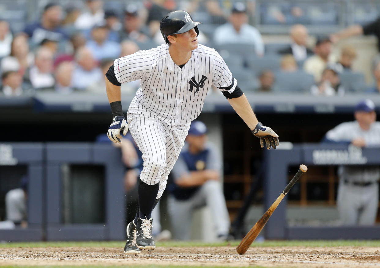 NEW YORK, NEW YORK - JUNE 19:   DJ LeMahieu #26 of the New York Yankees in action against the Tampa Bay Rays at Yankee Stadium on June 19, 2019 in New York City. The Yankees defeated the Rays 12-1.  (Photo by Jim McIsaac/Getty Images)