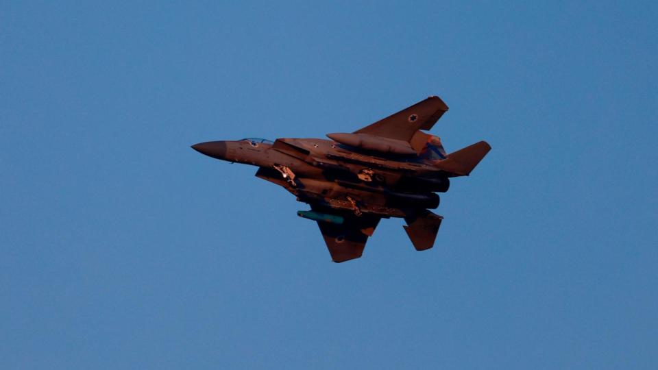 PHOTO: An Israeli army F-15 fighter jet flies over central Israel on April 15, 2024. (Menahem Kahana/AFP via Getty Images)