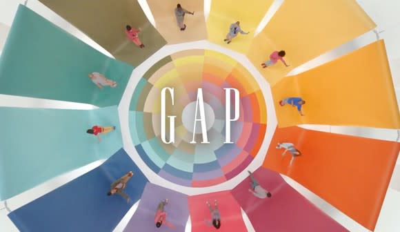 Gap logo with 12 people on different colored segments arranged in a circle.