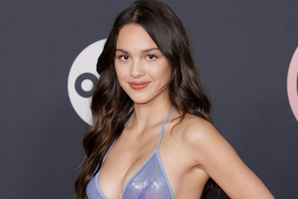 <p>Amy Sussman/Getty </p> Olivia Rodrigo attends the 2021 American Music Awards