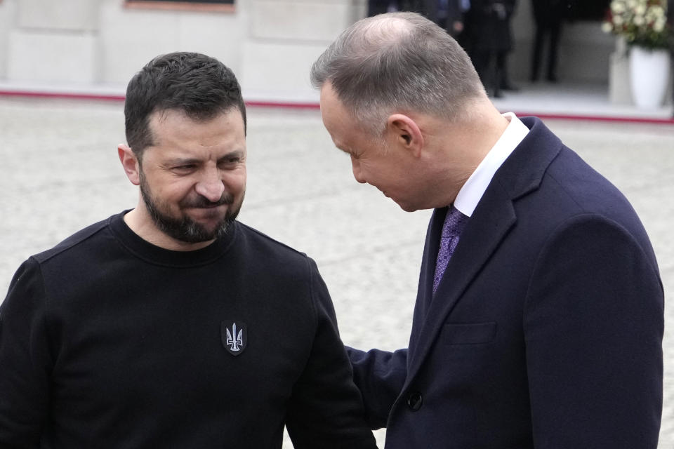 Poland's President Andrzej Duda, right, welcomes Ukrainian President Volodymyr Zelenskyy as they meet at the Presidential Palace in Warsaw, Poland, Wednesday, April 5, 2023. (AP Photo/Czarek Sokolowski)