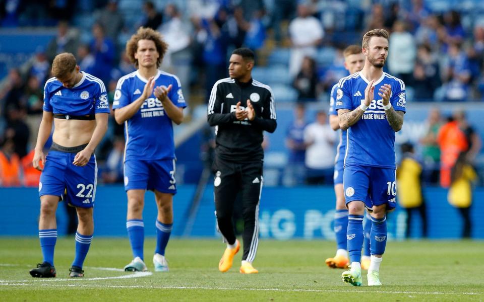 Leicester City's Wout Faes and James Maddison look dejected - Action Images via Reuters