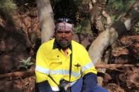 Puutu Kunti Kurrama and Pinikura (PKKP) Director and Puutu Kunti Kurruma Land Committee Chairperson Burchell Hayes poses in the Pilbara region of Western Australia