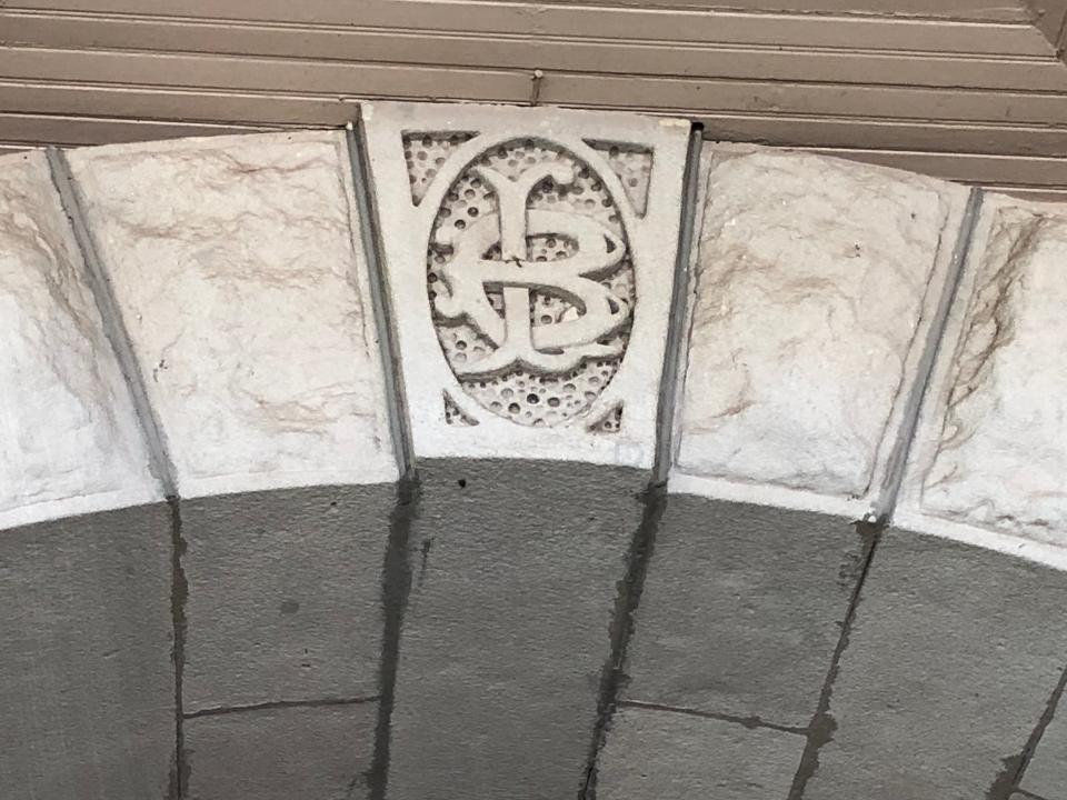 Above the front doorway of the Bivins Home, chiseled in stone, are the initials of Lee Bivins.