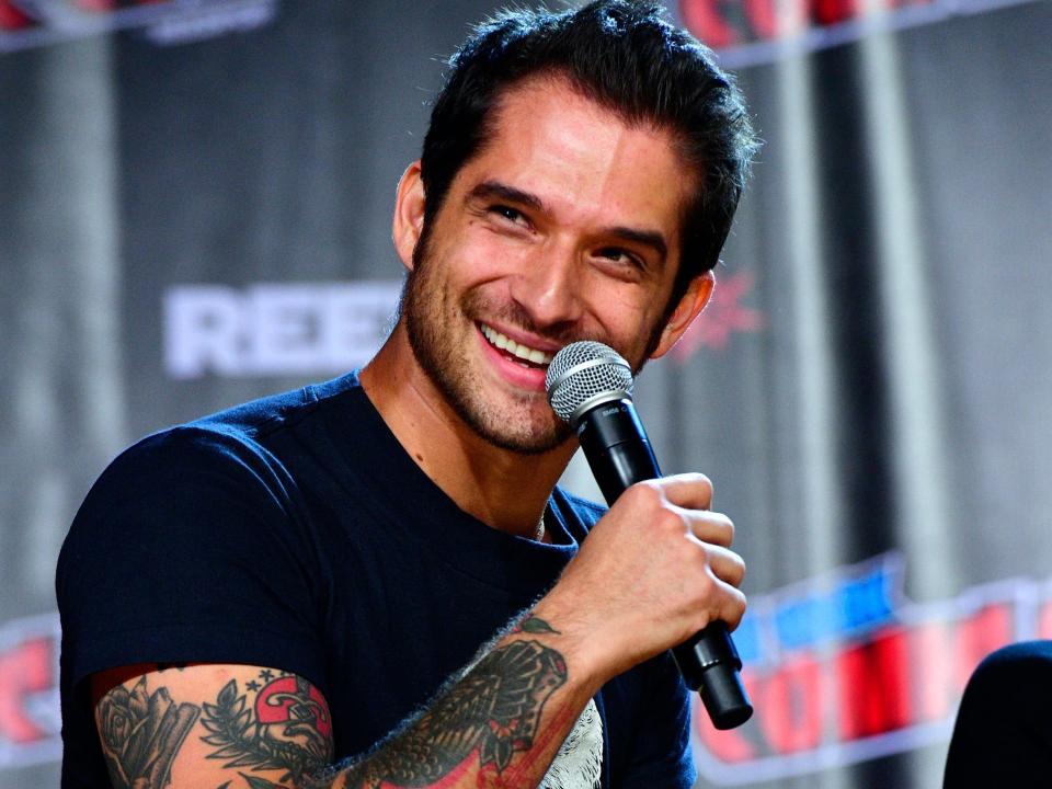 Tyler Posey speaks onstage during the Teen Wolf: The Movie & Wolf Pack panel at New York Comic Con on October 07, 2022 in New York City.