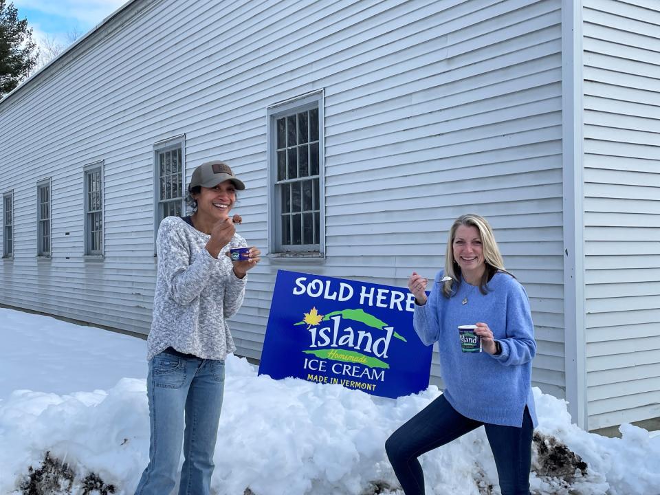 Operations Manager Maura Fitzgerald, right, and her co-worker Celina Ellison take an ice cream break in front of the building in Williston that will become Island Homemade Ice Cream's first company-owned scoop shop.