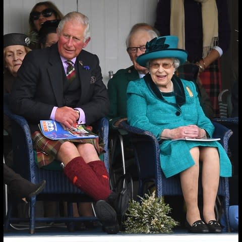 The Queen, wearing a striking jade-green dress suit, was joined by Prince Charles - Credit: Andrew Parsons / i-Images 