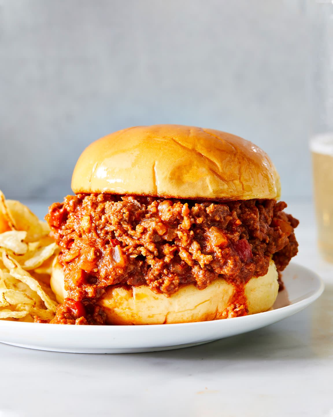 sloppy joes served on a toasted bun with chips