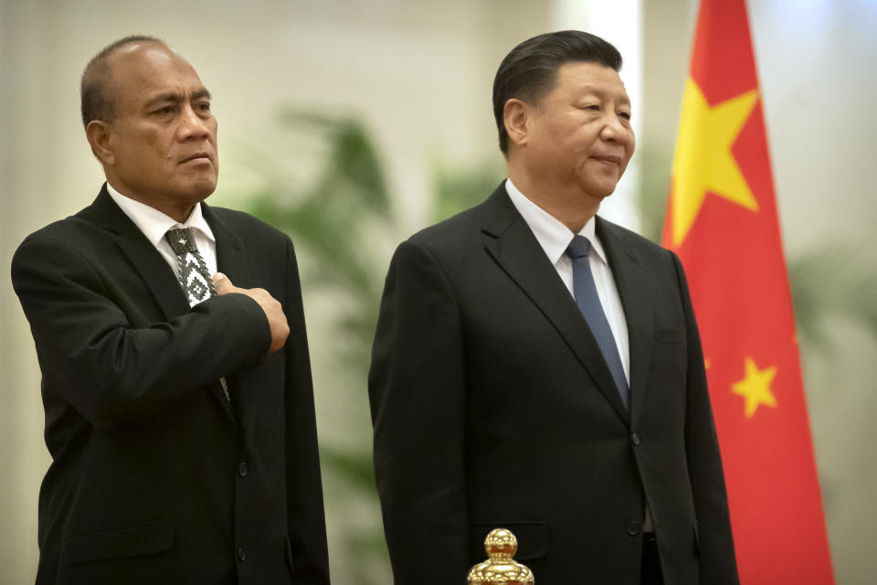 Kiribati's President Taneti Maamau, left, and Chinese President Xi Jinping stand together during a welcome ceremony at the Great Hall of the People in Beijing, Monday, Jan. 6, 2020. (AP Photo/Mark Schiefelbein)