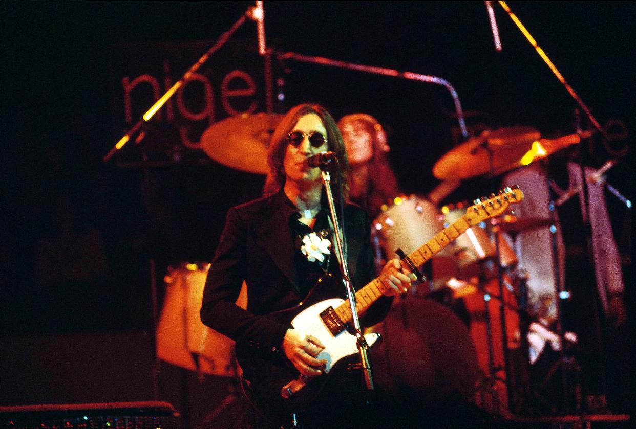 UNITED STATES - NOVEMBER 28:  MADISON SQUARE GARDEN  Photo of John LENNON, performing live onstage - last live appearance, with Elton John, playing Fender Telecaster guitar with capo  (Photo by Steve Morley/Redferns)