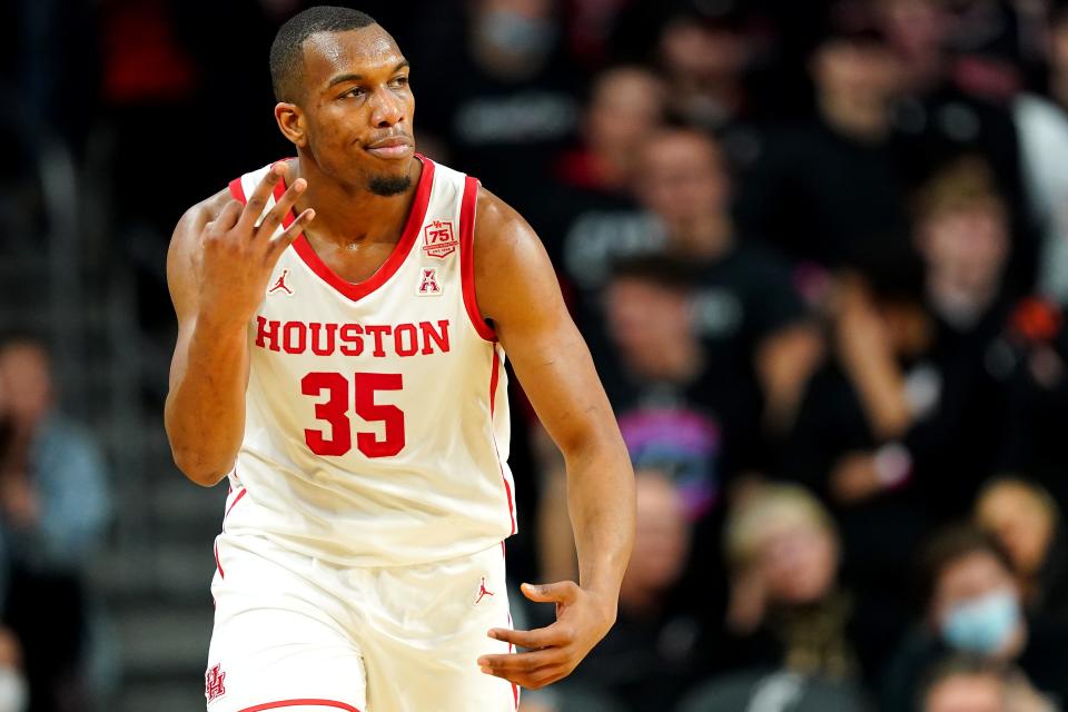 Houston Cougars forward Fabian White Jr. (35) reacts after scoring a 3-point basket in the first half of an NCAA menÕs college basketball game against the Cincinnati Bearcats, Sunday, Feb. 6, 2022, at Fifth Third Arena in Cincinnati.