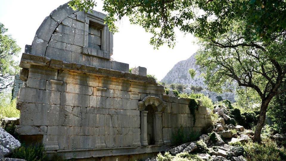 The ruins of the gymnasium building show it was once fronted by elaborate arches. - Barry Neild/CNN