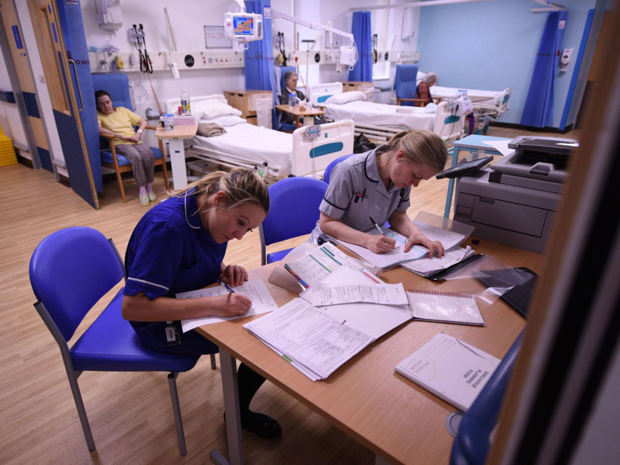 Members of clinical staff complete paperwork in the Accident and Emergency department of the 'Royal Albert Edward Infirmary' in Wigan: Getty