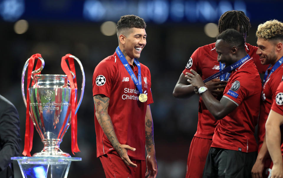 Liverpool's Roberto Firmino during the celebrations after the UEFA Champions League Final at the Wanda Metropolitano, Madrid. (Photo by Mike Egerton/PA Images via Getty Images)