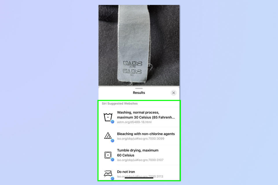 A screenshot showing how to use Visual Look Up to decipher Laundry instructions on iPhone