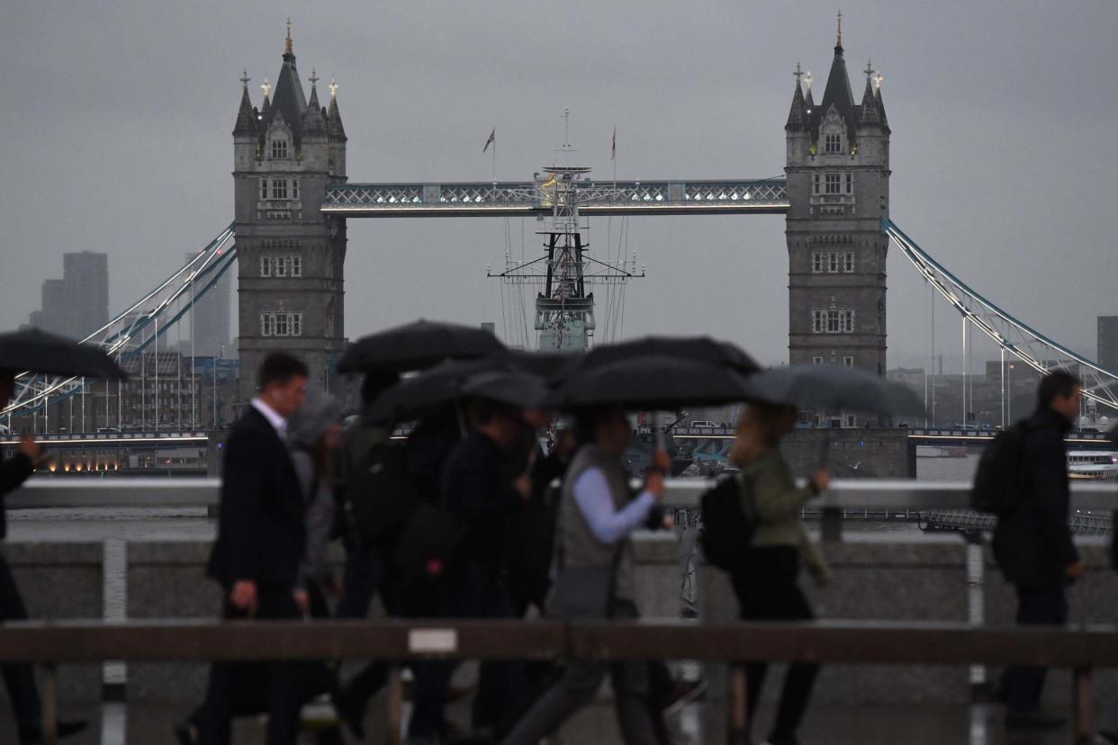 Wet weather: London is among a number of English cities that will see heavy rain on Monday: PA