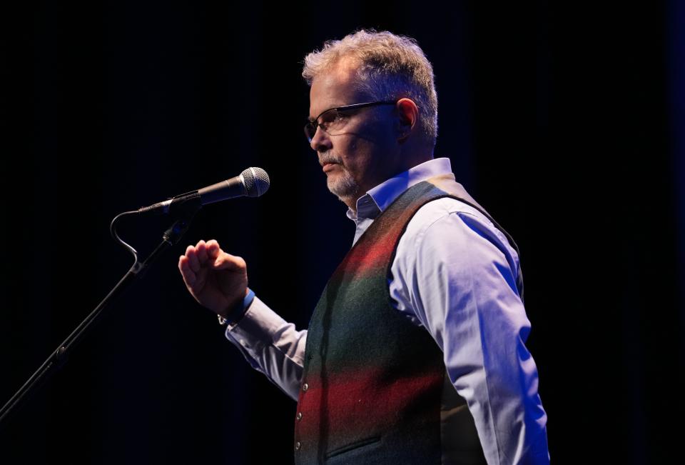 Tim Johnson tells his story during the Des Moines Register's Storytellers Project at Hoyt-Sherman Place in Des Moines on Tuesday, Oct. 25, 2022.