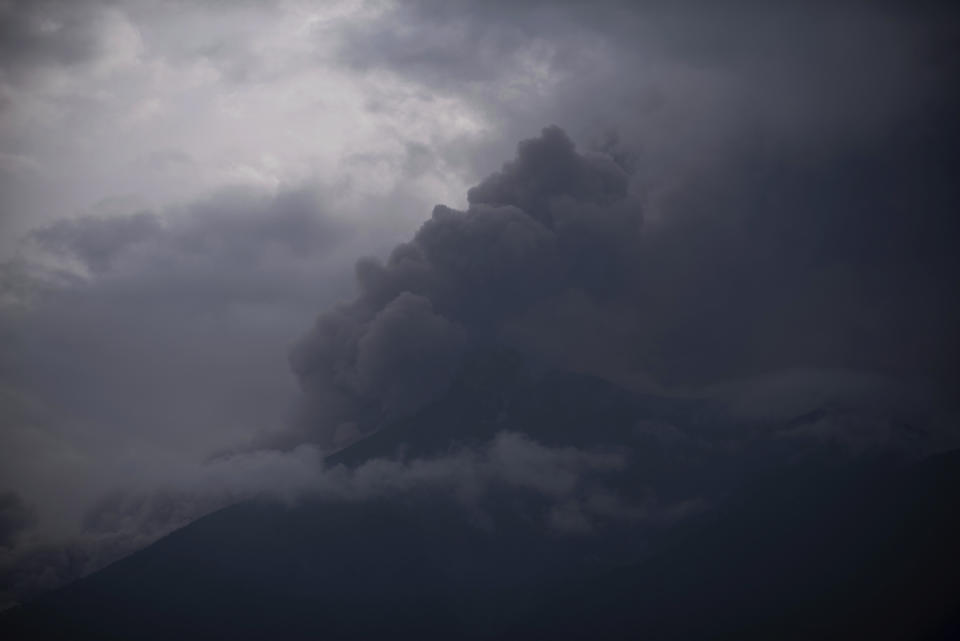 <p>Volcan de Fuego, or Volcano of Fire, blows outs a thick cloud of ash, as seen from Alotenango, Guatemala, June 3, 2018. (Photo: Santiago Billy/AP) </p>