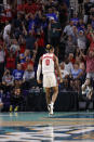 Ohio State guard Meechie Johnson Jr. (0) reacts after scoring against Seton Hall during the second half of an NCAA college basketball game Monday, Nov. 22, 2021, in Fort Myers, Fla. (AP Photo/Scott Audette)