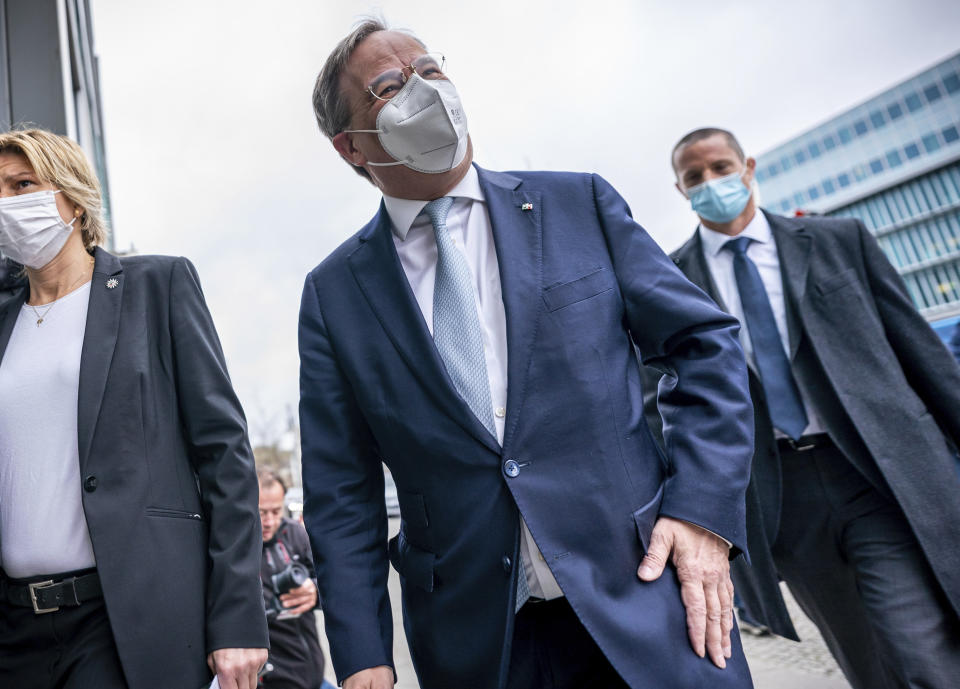 Armin Laschet, CDU federal chairman and minister president of North Rhine-Westphalia, arrives at the CDU presidium meeting in front of party headquarters in Berlin, Germany, Monday, April 12, 2021. (Michael Kappeler/dpa via AP)