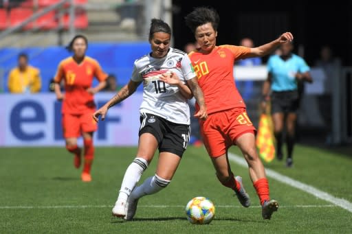 Germany's Dzsenifer Marozsan (L) might miss the rest of the World Cup after suffering a broken toe against China