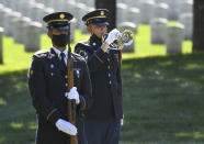 A Honor Guard plays Taps for Korean War veteran Army Cpl. Walter Smead, a member of Battery A, 57th Field Artillery Battalion, 7th Infantry Division who was killed during the 1950 Battle of the Chosin Reservoir, is laid to rest with full military honors at Gerald B. H. Solomon Saratoga National Cemetery, on Monday, Sept. 20, 2021, in Schuylerville, N.Y. Korean War veteran Army Cpl. Walter Smead, a member of Battery A, 57th Field Artillery Battalion, 7th Infantry Division who was killed during the 1950 Battle of the Chosin Reservoir, is laid to rest with full military honors at Gerald B. H. Solomon Saratoga National Cemetery, on Monday, Sept. 20, 2021, in Schuylerville, N.Y. Smead was finally laid to rest near his rural upstate New York hometown, seven decades after he was killed in the Korean War and months after his remains were finally identified with help from DNA analysis. (AP Photo/Hans Pennink)