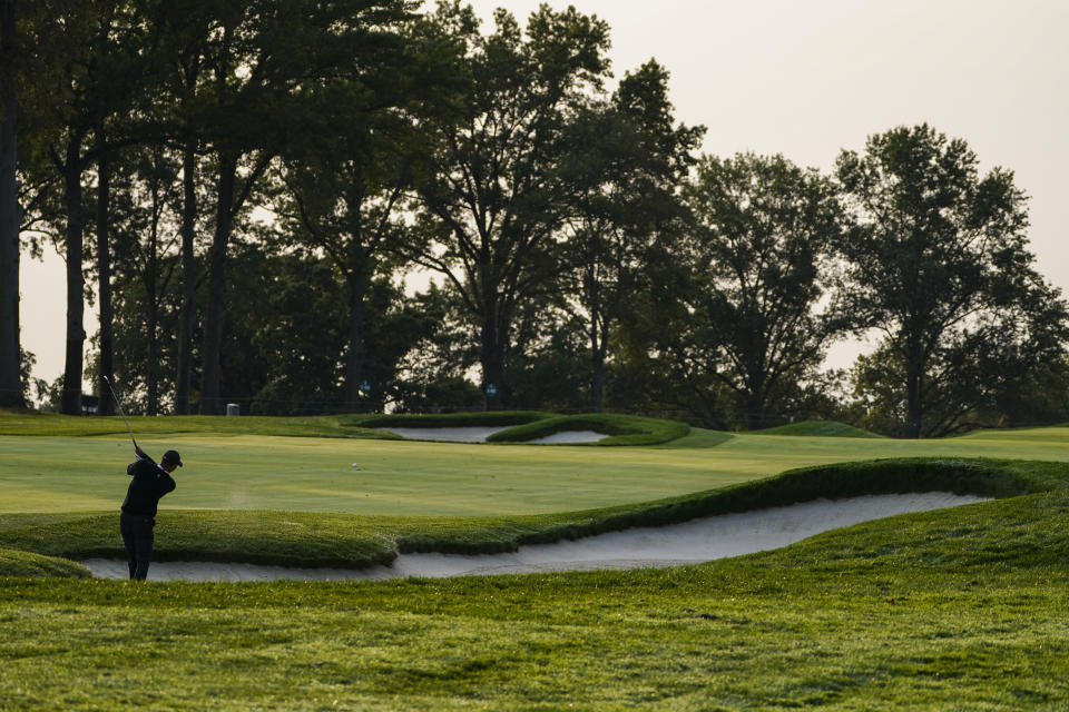 Tiger Woods hits from a bunker on the fifth fairway during practice before the U.S. Open Championship golf tournament at Winged Foot Golf Club, Wednesday, Sept. 16, 2020, in Mamaroneck, N.Y. (AP Photo/John Minchillo)