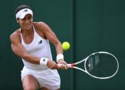 <p>Heather Watson of Great Britain plays a backhand during the Ladies Singles second round match against Annika Beck of Germany on day three of the Wimbledon Lawn Tennis Championships at the All England Lawn Tennis and Croquet Club on June 29, 2016 in London, England. (Photo by Shaun Botterill/Getty Images)</p>