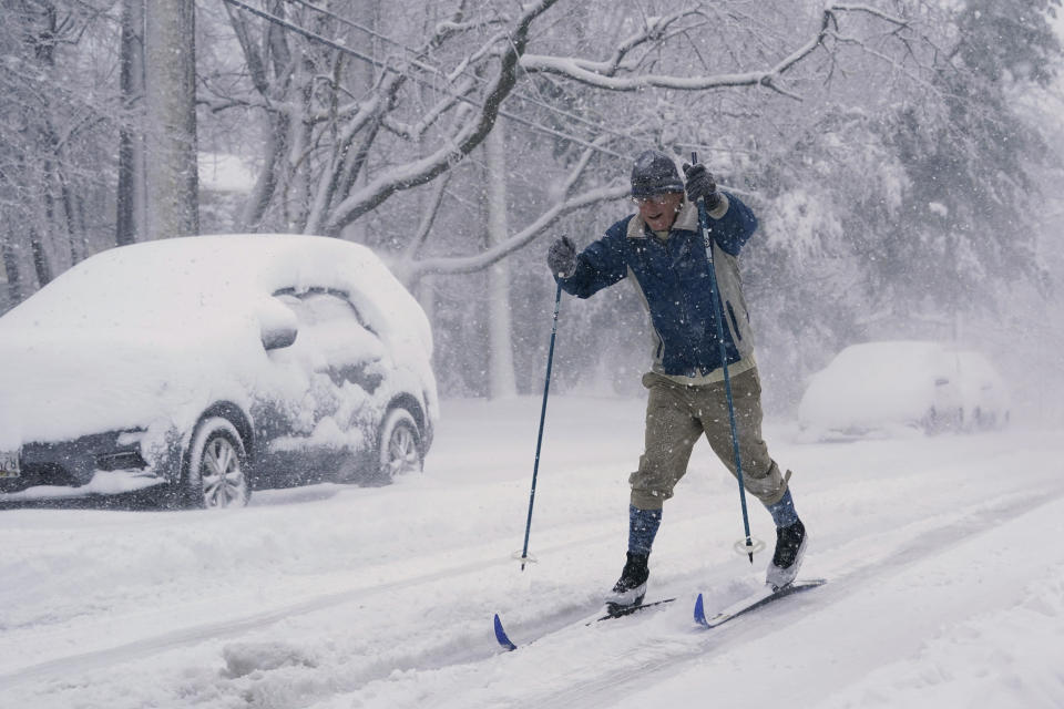 James Penn, of Annapolis, Maryland, cross country skis in Annapolis on Monday, January 3, 2022. A winter storm packing heavy snow rolled into the District of Columbia, northern Virginia and central Maryland overnight, bringing at least 3 to 7 inches of snow to the area through Monday afternoon. / Credit: Susan Walsh / AP