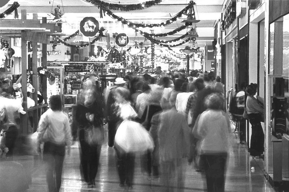 Crowds flood the DeSoto Square Mall on Christmas Eve 1984. The mall would get decked out for Christmas every year.