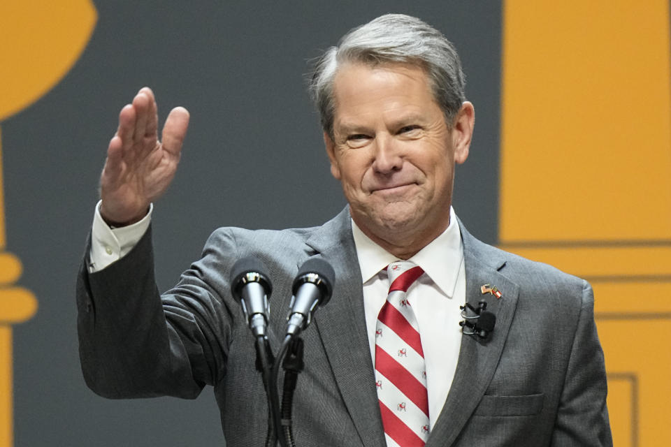 FILE - Georgia Gov. Brian Kemp speaks after being sworn in as Georgia's Governor during a ceremony on Jan. 12, 2023, in Atlanta. Kemp is trying to steer the Republican Party away from Donald Trump and his 2020 election lies, but his state party shows little interest in moving on. (AP Photo/Brynn Anderson, File)