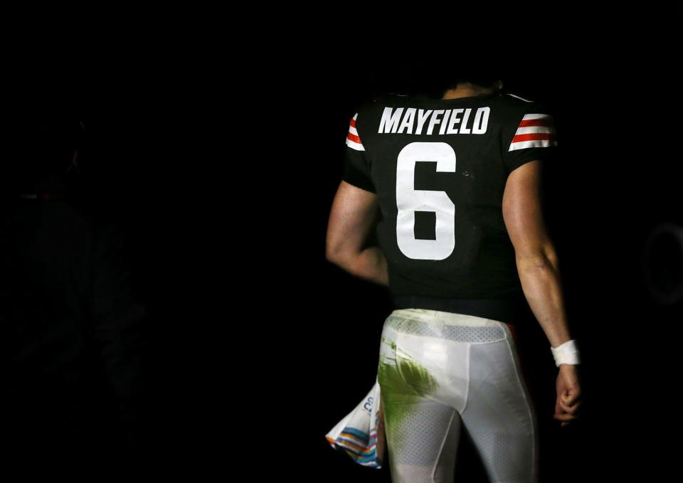 Cleveland Browns quarterback Baker Mayfield heads to the locker room following a 37-14 loss against the Arizona Cardinals at FirstEnergy Stadium, Sunday, Oct. 17, 2021, in Cleveland, Ohio. Baker's streak of 53 consecutive starts will come to an end on Thursday as Case Keenum has been named the starter for the Browns' matchup against the Denver Broncos.