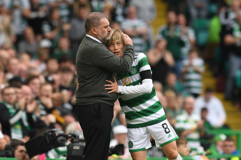 Ange Postecoglou (left) embracing Japanese striker Kyogo Furuhashi, whom he had successfully brought into his Celtics team