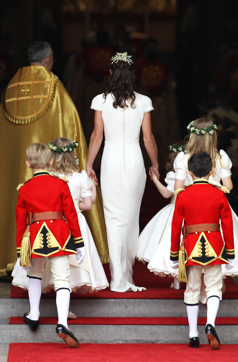 Pippa Middleton enters the Abbey with the bridesmaids and page boys