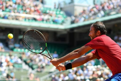 Mohamed Safwat had a day out on Philippe Chatrier court against fourth seed Grigor Dimitrov