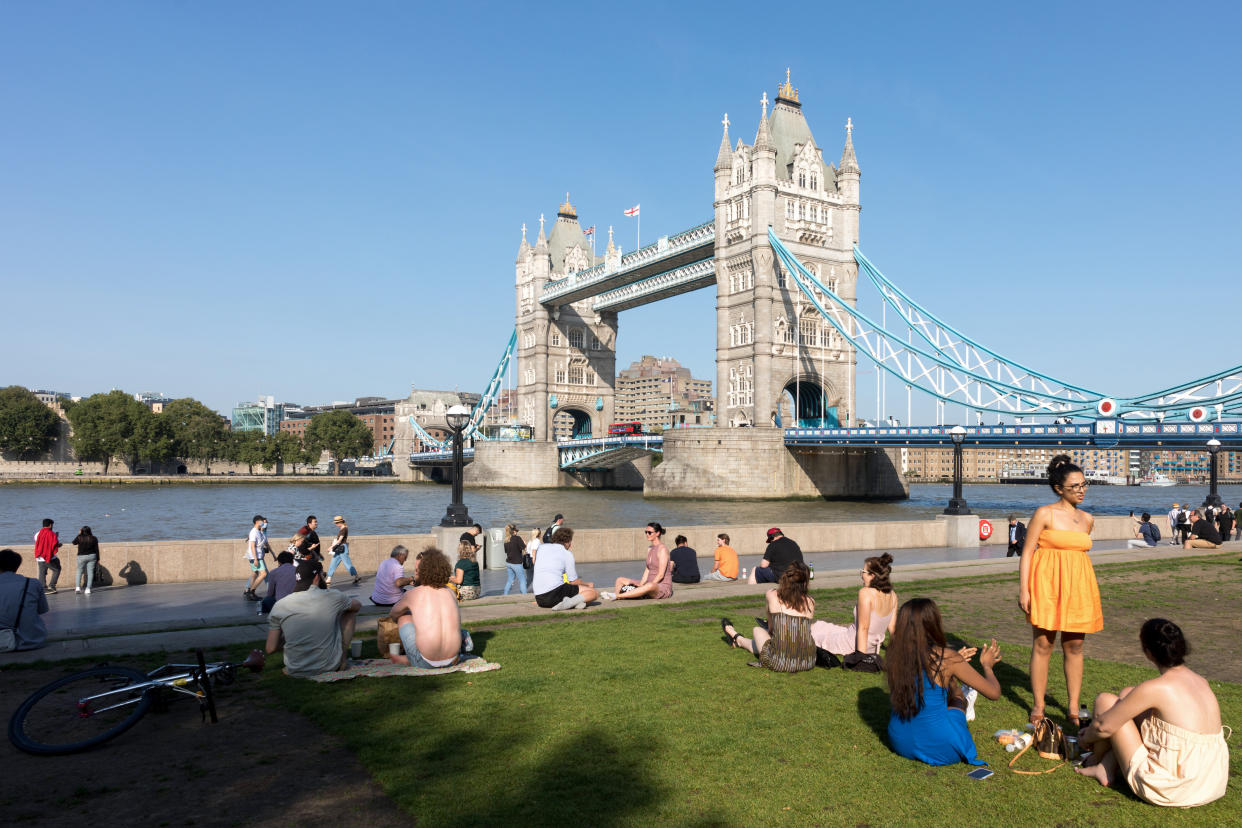 LONDON, UNITED KINGDOM - 2021/09/07: Tower Bridge is pictured from the City Hall as people sit under the sun.
As the UK is hit by a heatwave in September, Londoners are seen spending time outdoors under the intense sun. (Photo by Belinda Jiao/SOPA Images/LightRocket via Getty Images)