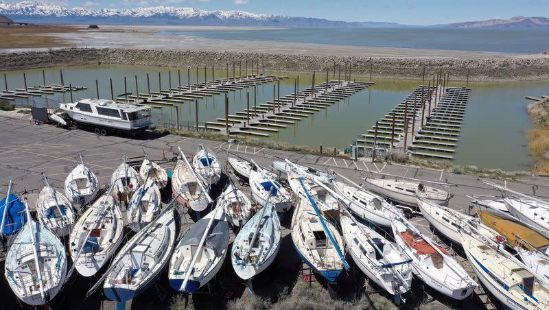 Boats are pictured on land at the Great Salt Lake State Park marina in Magna on Wednesday, April 19, 2023. Rising water levels are making the lake accessible to boats again.